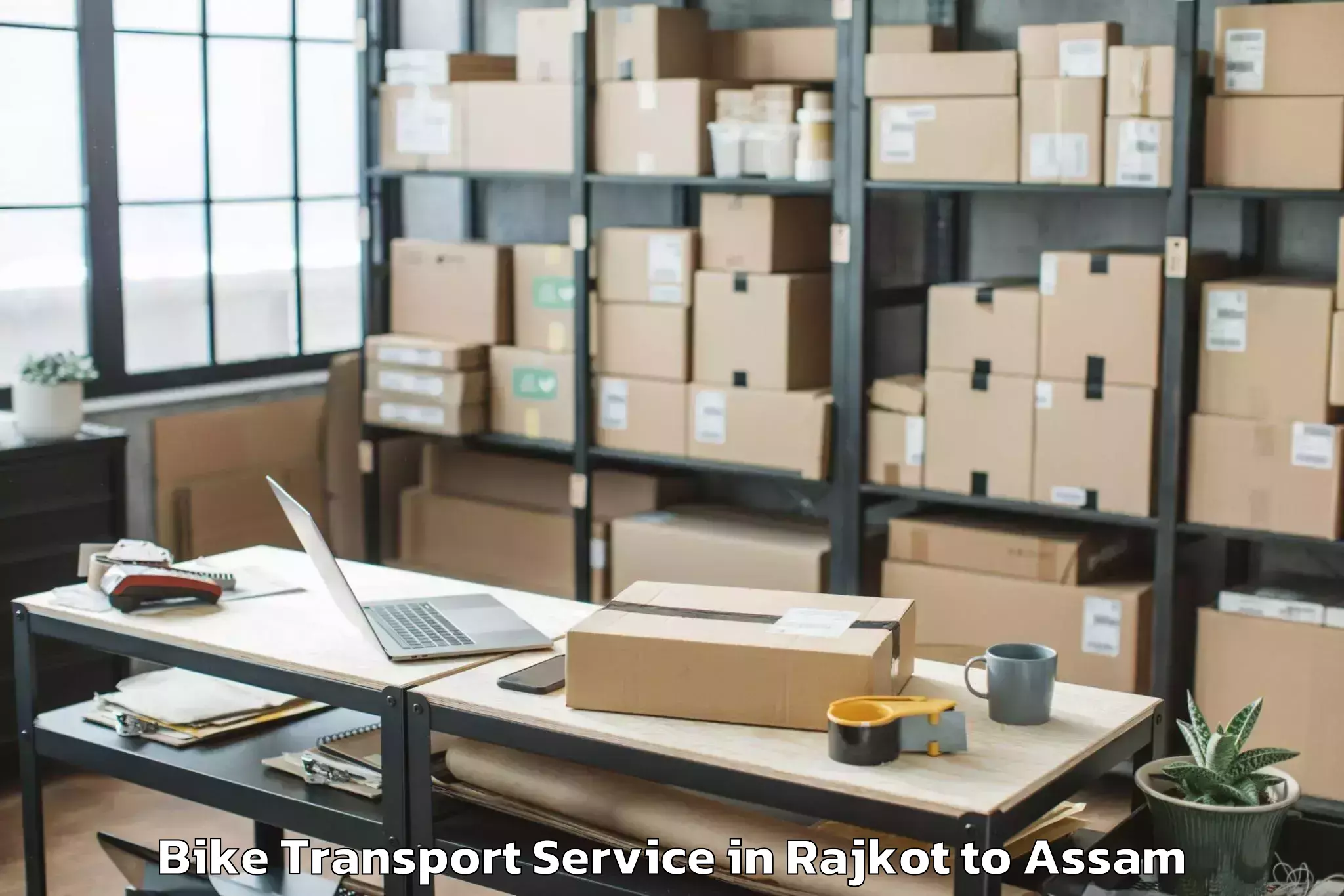 Book Rajkot to Bijni Pt Bike Transport Online